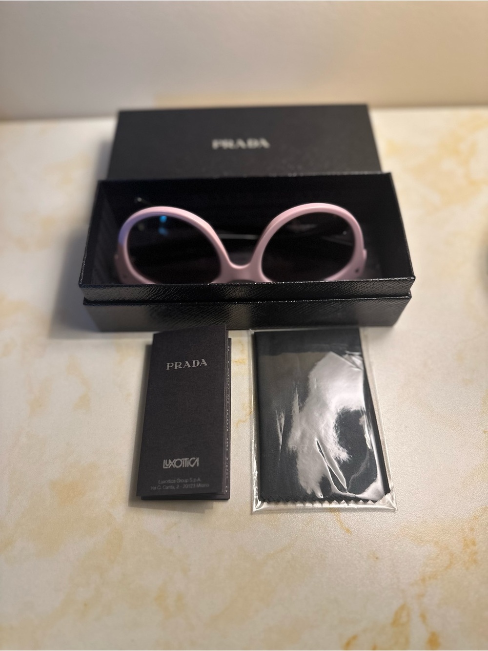Very unique and distinctive Prada sunglasses with a statement-making design. - Picture 5 of 9